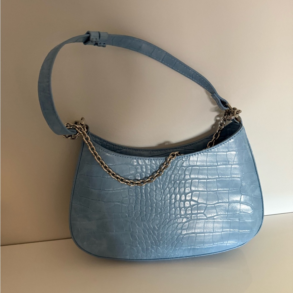 Light blue snakeskin purse; worn once